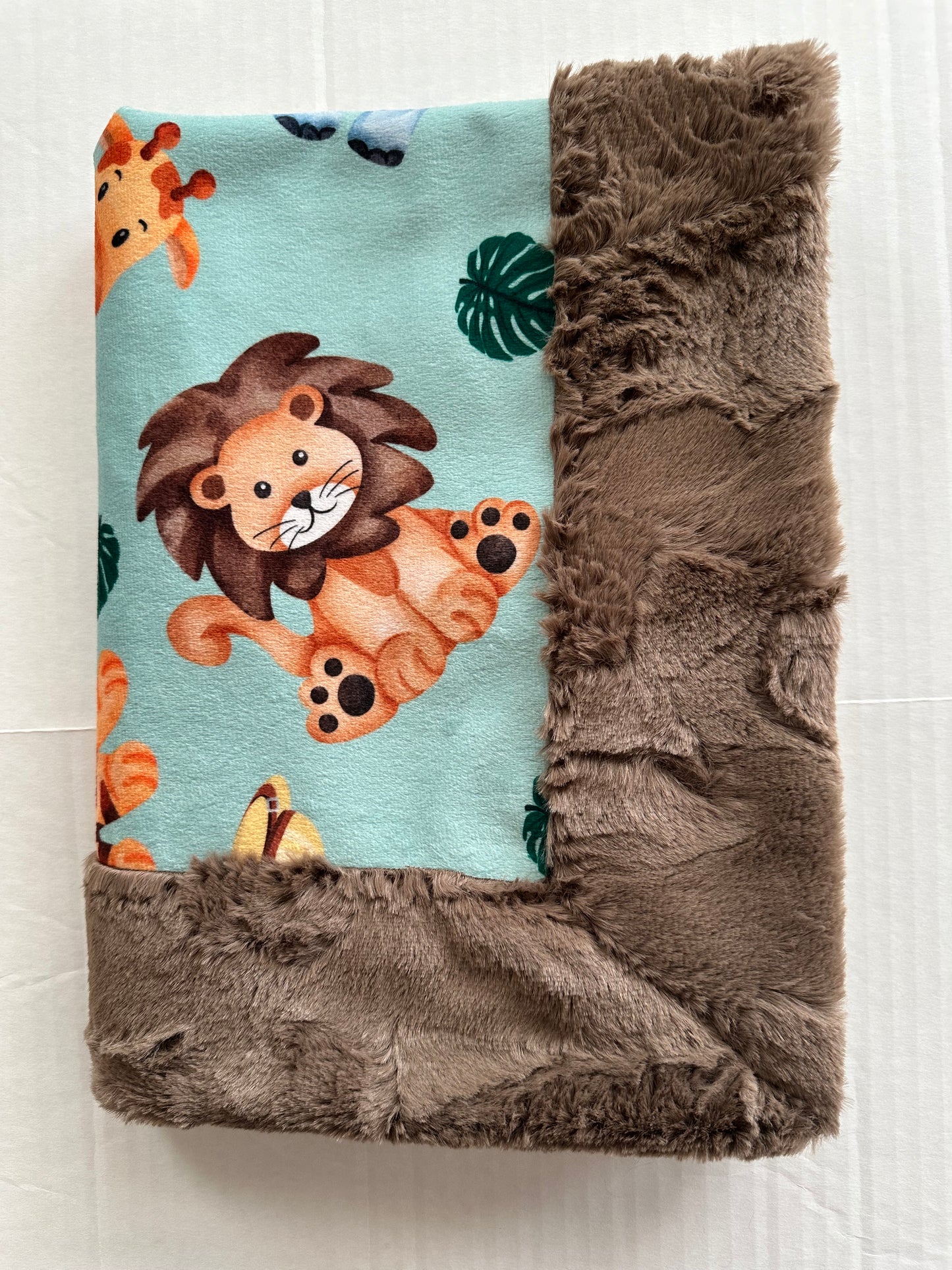 Safari Animals Green on Truffle Luxe 17x26 Lovey Size Baby Blanket